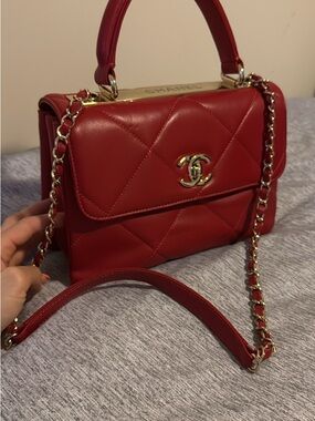 Red Quilted Shoulder Bag with Gold Chain and Top Handle